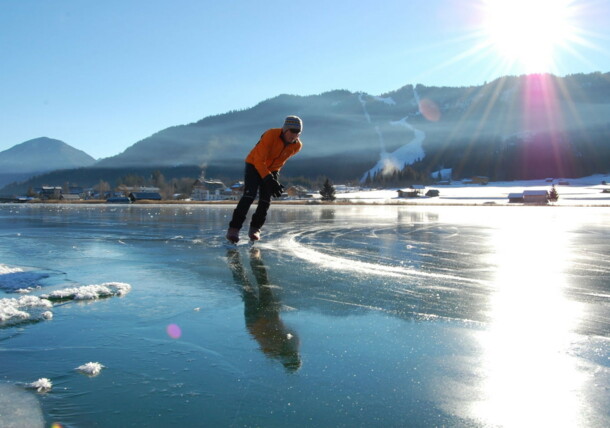     Weissensee Lake: Ice skating in winter 
